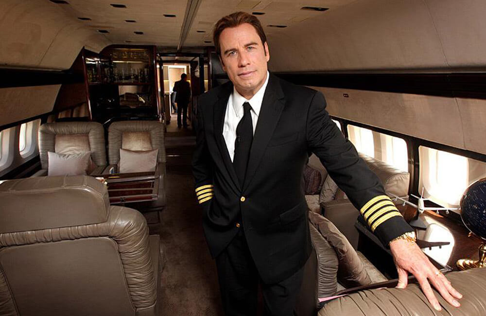 John Travolta Boeing 707-138 @CharterAircraft / Facebook.com