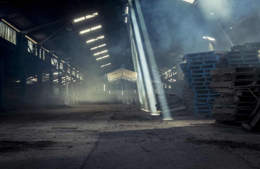 Glimmer of Hope in the Abandoned Warehouse ©Cameron Watson/shutterstock.com